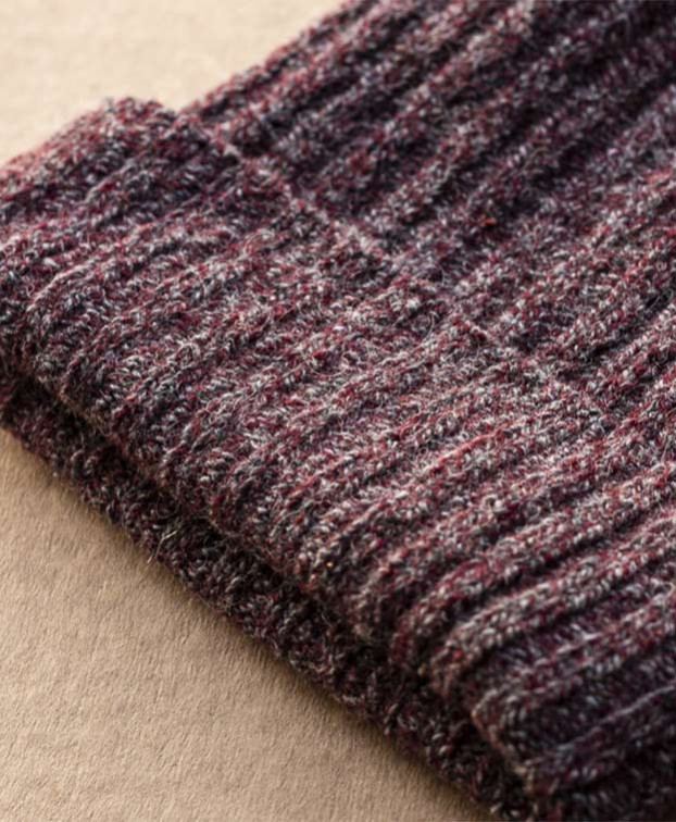 Bonnet Mont Blanc bordeaux en laine - Vue matière Bonnet Mont Blanc bordeaux en laine - Vue matière